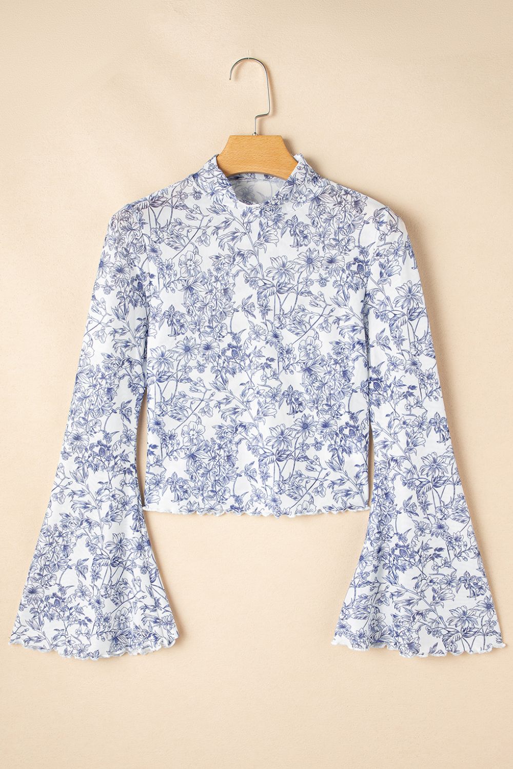 Women’s stylish mock neck blouse in floral print, U.S. fashion trend 2025