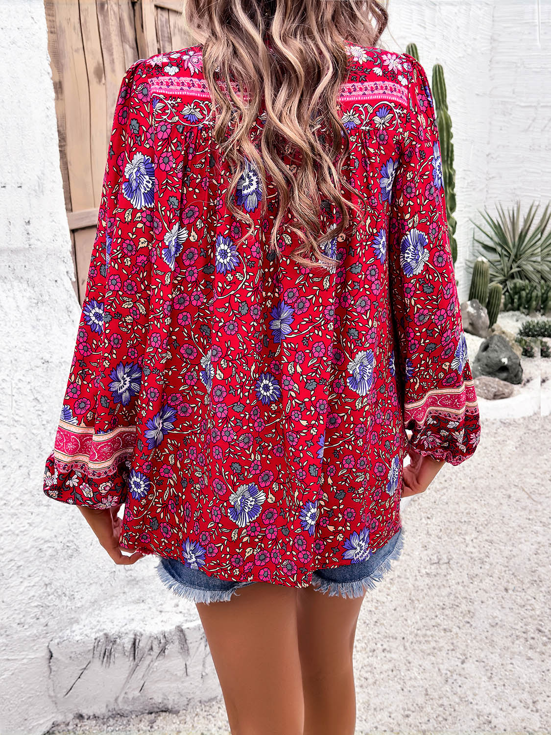 Devine Printed Tie Neck Long Sleeve Blouse Trandify deal
