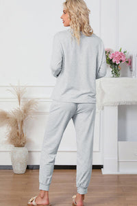 Round Neck Top and Drawstring Pants Lounge Set Trandify deal