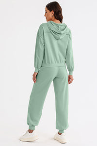 Cutout Drawstring Hoodie and Joggers Active Set Trandify deal